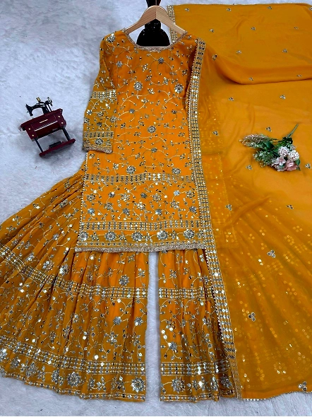 Stunning yellow Georgette lehenga suit with intricate embroidery and a matching dupatta, perfect for