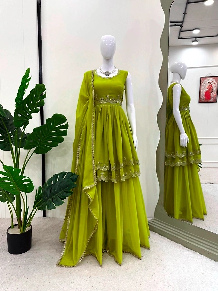 Elegant parrot green gown with detailed embroidery, styled as a designer palazzo suit for ready wear