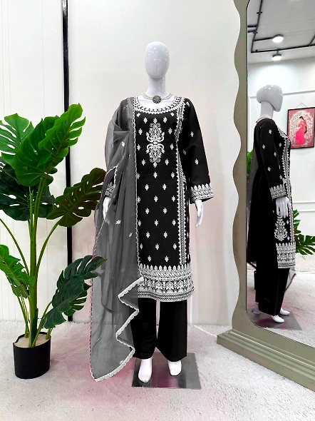 Elegant black suit with white chikan embroidery, crafted from Roman silk.