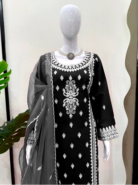 Black Roman silk suit adorned with beautiful white chikan embroidery.