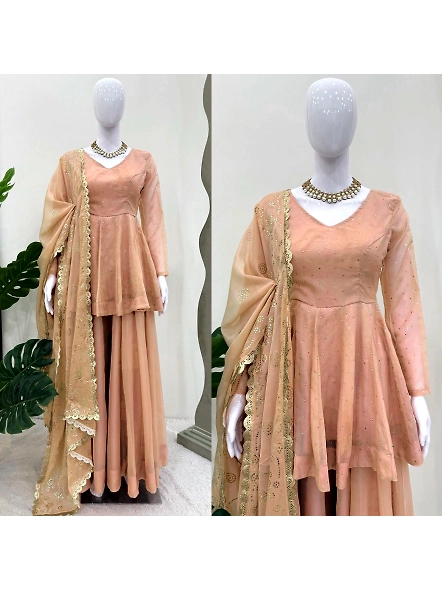 A woman wearing a beige lehenga and a gold necklace, showcasing the elegant Tabby Organza Kurta Set.