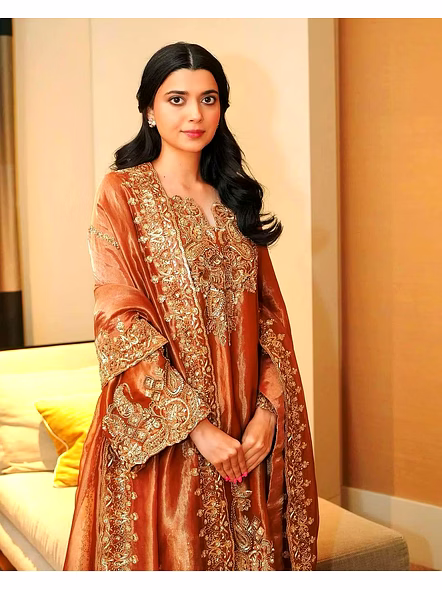 women brown fendi silk suit