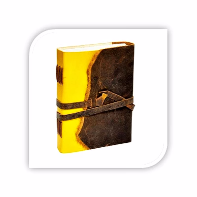 yellow brown leather travel journal