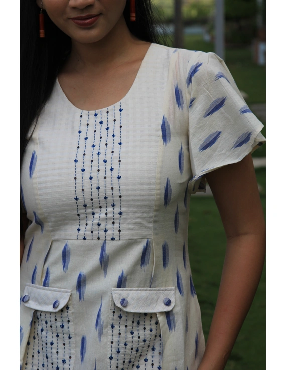WHITE IKAT PLEATED DRESS WITH EMBROIDERED POCKETS AND YOKE: LD550C-XXL-2