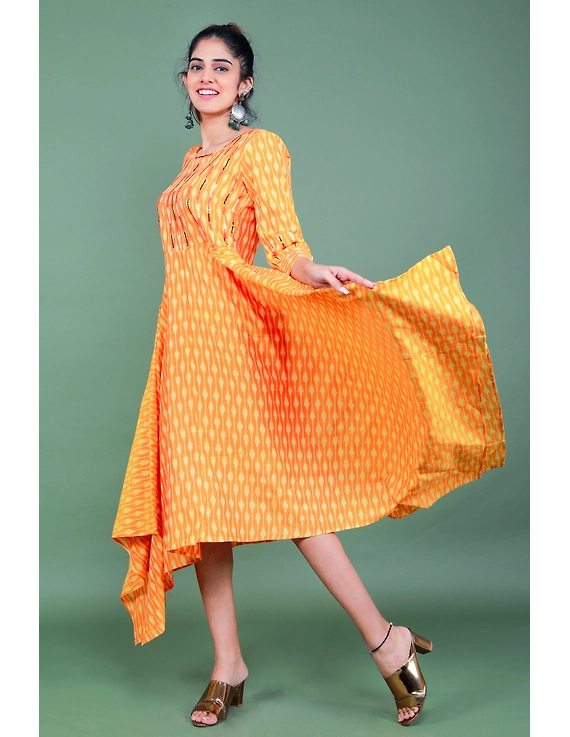 Golden yellow semi silk ikat dress with a handkerchief hem: LD500C-M-1