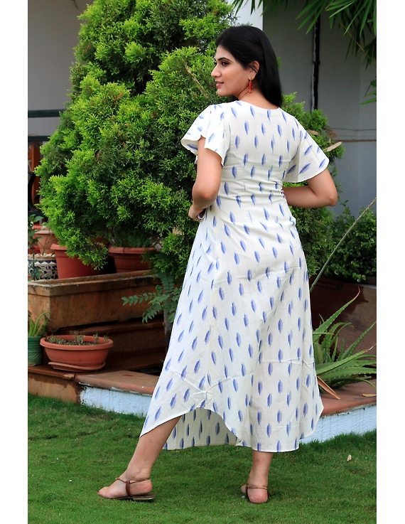 WHITE IKAT PLEATED DRESS WITH EMBROIDERED POCKETS AND YOKE: LD550C-S-3