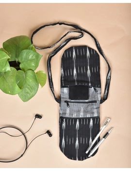 Multi-pocket sling bag in Black ikat cotton: CPI01E-1-sm
