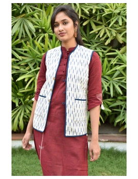 Reversible sleeveless quilted jacket in blue and white ikat : LB170-L-1-sm