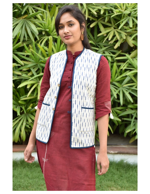Reversible sleeveless quilted jacket in blue and white ikat : LB170-M-1