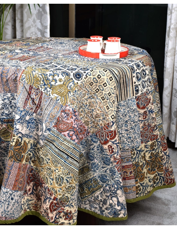 Round kalamkari patchwork and black mangalgiri reversible table cloth: TBKR01A-3