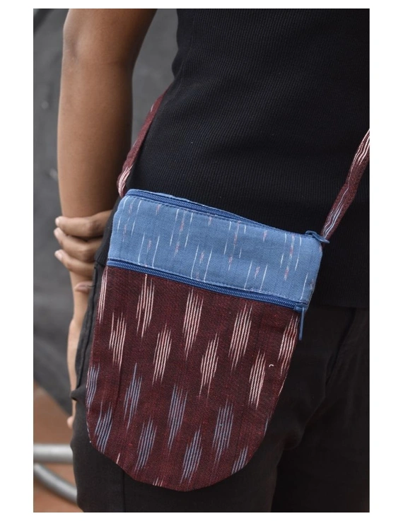 Multi-pocket sling bag in Black ikat cotton: CPI01ED-2