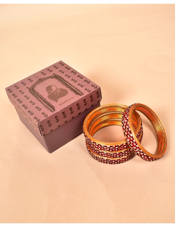 Pair of broad bangles in red and golden tones: HC05GO-HC05GO10