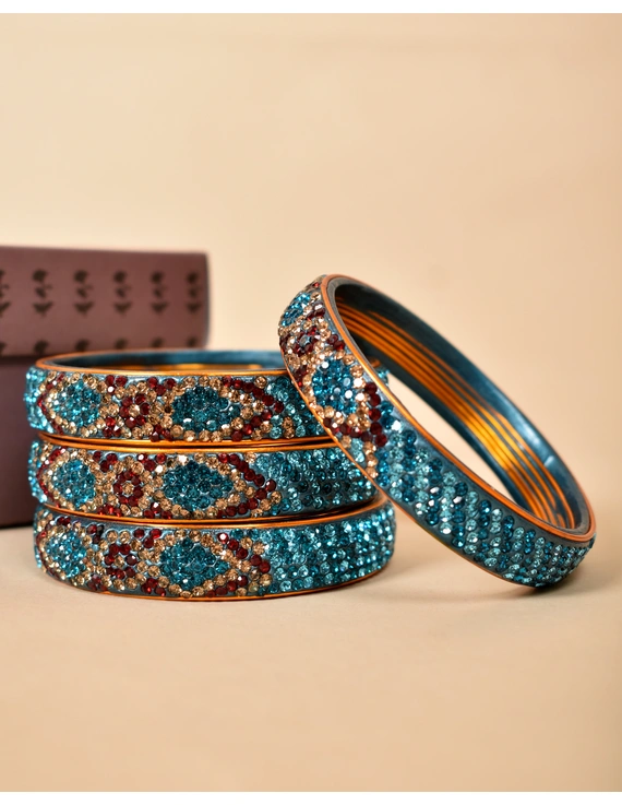 Pair of broad bangles in golden and blue tones: FP03SG-FP05SG08