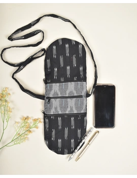 Multi-pocket sling bag in Black ikat cotton: CPI01ED-3-sm