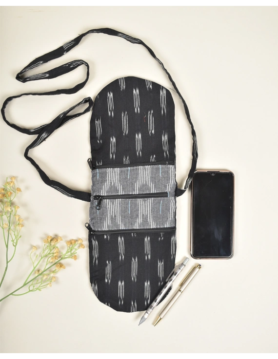 Multi-pocket sling bag in Black ikat cotton: CPI01ED-3