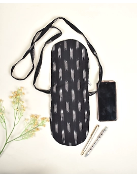 Multi-pocket sling bag in Black ikat cotton: CPI01ED-2-sm