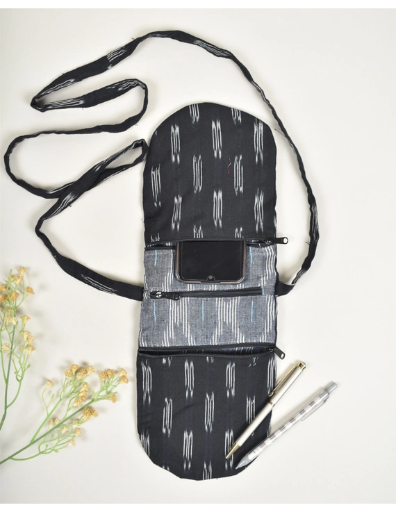 Multi-pocket sling bag in Black ikat cotton: CPI01ED-1