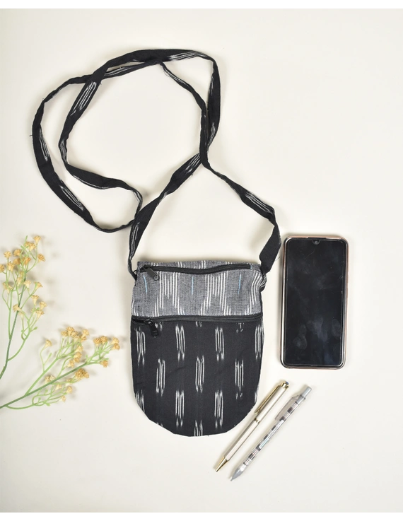 Multi-pocket sling bag in Black ikat cotton: CPI01ED-CPI01ED