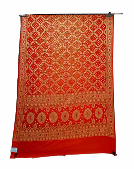 All Over Orange Color Dupion Silk Bandhani Saree