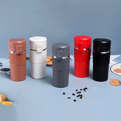 stainless steel vacuum insulated coffee cup with silicone sleeve