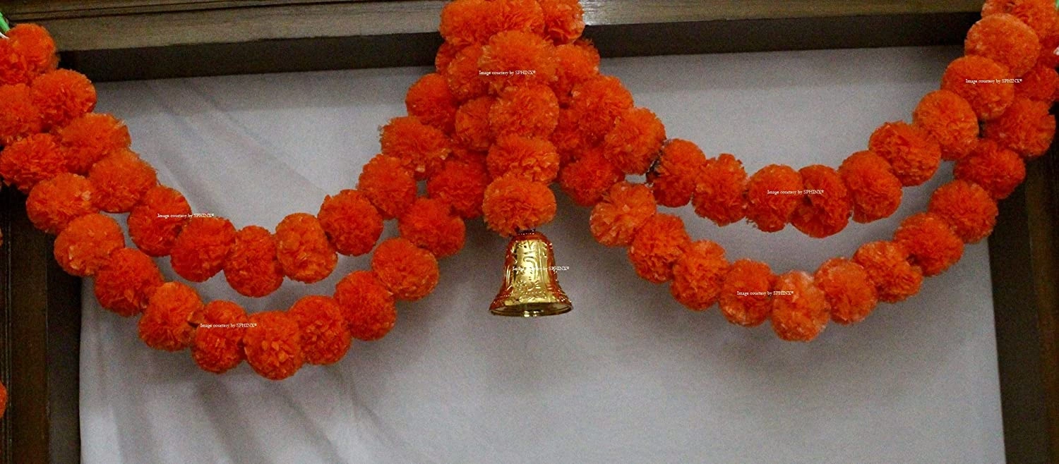 Package contains- 1 set of SPHINX Artificial Marigold Fluffy Flower Garlands Door Hanging Toran for decoration Made in India and made up of Recycled plastic and fibers. A completely handmade product.T-1