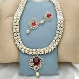 ravishing dual line pearl necklace set