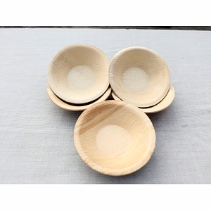 Areca leaf palm plates and bowls (dinnerware) and Bamboo handicrafts