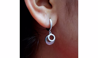 Stellar Sparkle: Sterling Silver Circular Diamond Earrings B321