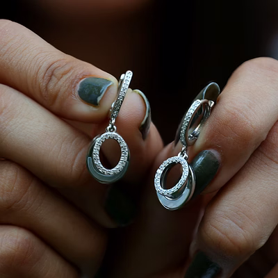 diamond halo gleam: sterling silver circular earring b322