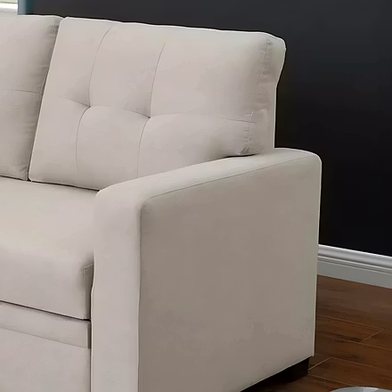Close-up of Casae sectional sofa’s right armrest and tufted backrest in beige upholstery