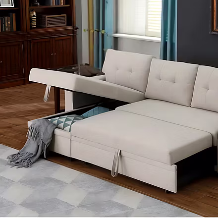 Casae sofa cum bed with lounger lifted to show hidden storage compartment