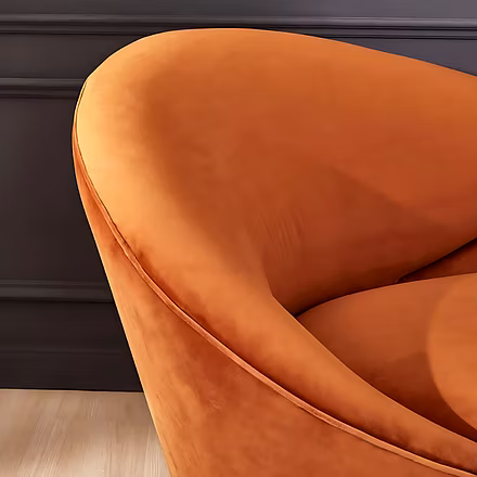 &quot;Close-up of plush orange velvet armrest on Woodkraft Studio 3 seater designer sofa Hyderabad&a