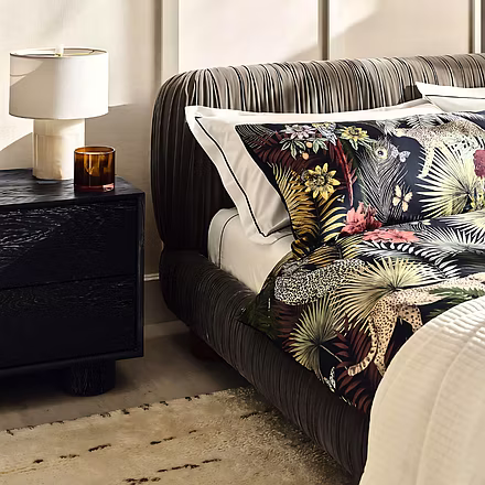 Frillora upholstered bed styled in modern bedroom décor with pleated fabric design – Woodkraft Studi