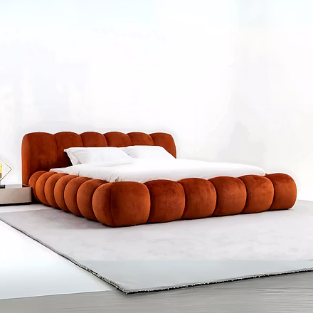 Cocoon upholstered king size bed in bold red velvet finish with plush rounded design by Woodkraft S