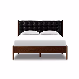 Front view of handcrafted Master Teakwood bed with deep-buttoned black headboard and premium teak fr