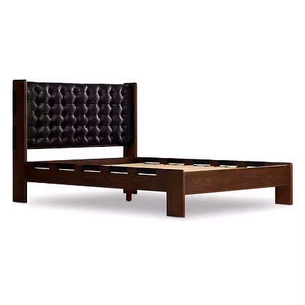 Master Teakwood bed with black tufted upholstered headboard and solid wood frame – angled view.