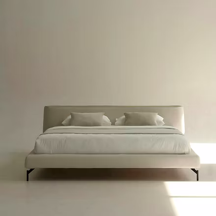 Full frontal image of Gala upholstery in soft cream tones with streamlined silhouette and elevated f