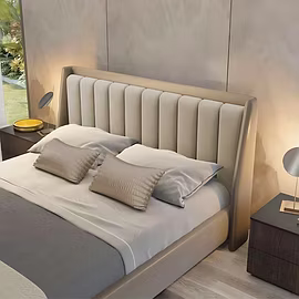 Angled view of Linea upholstered bed (king and queen sizes) showcasing the padded headboard and eleg