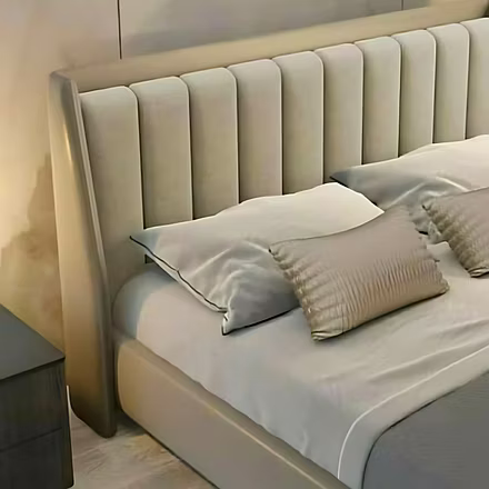 Close-up view of the left side of the Linea upholstered bed (king and queen sizes) highlighting soft
