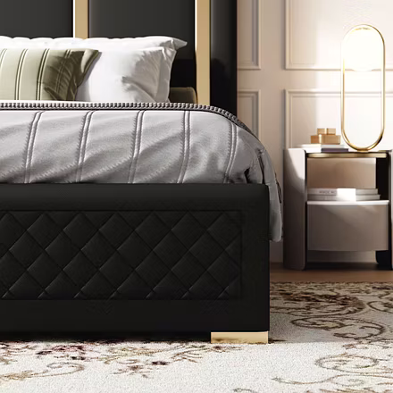 Close-up of quilted black upholstered bed base with gold legs, Tune luxury bed in king and queen siz