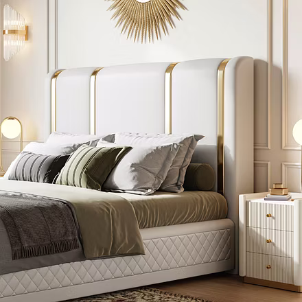 Side view of beige Tune upholstered bed with tall headboard and gold trims, Woodkraft Studio furnitu