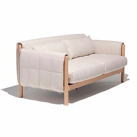 (Angle View): Side-angled view of customizable wooden sofa with padded armrests and teakwood frame.