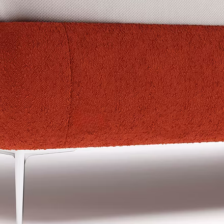 Fabric texture and upholstery detail of Tovia bed in terracotta shade – suitable for king size and q