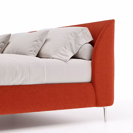 Detailed corner design of Tovia upholstered bed in soft terracotta finish – available as king or que