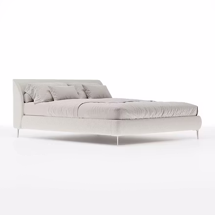 Angled view of Tovia upholstered bed in ivory white finish – available in both king and queen sizes.