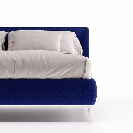 Close-up of headboard and pillow arrangement on Tovia upholstered bed – king and queen size.