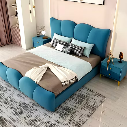&quot;Angled view of Dove upholstered bed in a stylish modern bedroom, featuring a plush teal frame,