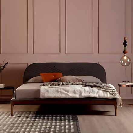 Close-up of Tanalin teakwood upholstered bed – detailed teak finish and soft fabric headboard, avail