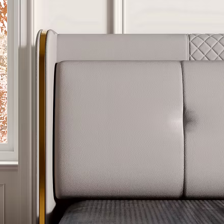 Close-up of Nova padded headboard detail and gold edge trim — King/Queen size option.