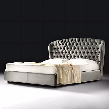 Side view of the Stars bed showing its low-profile padded frame and optional under-bed storage drawe